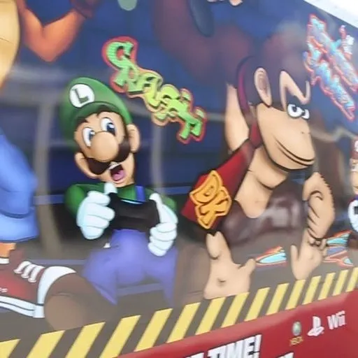 A close up of the mario bros. And donkey kong video game